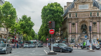 Poster - Street view of Place Saint-Michel with ancient fountain timelapse, Paris