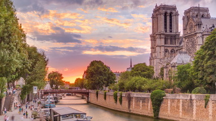 Poster - Sunset view of Cathedral Notre Dame de Paris timelapse in Paris, France.