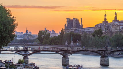 Wall Mural - View on Pont des Arts in Paris at sunset timelapse, France