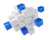 Blue cubes from heap of white cubes over white background - software module, teamwork or standing out from the crowd leadership concept