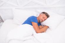 Peaceful Mature Man Relaxing. Good Sleep Is Reachable Dream. World Sleep Day. Benefits Of Good And Healthy Sleep. Breathe Easily, Sleep Well. Handsome Man In Bed. Sleeping Guy At Home. Need More Rest