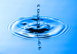 © RooM The Agency - Close-up of a water droplet and splash crown