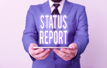 Poster - Word writing text Status Report. Business photo showcasing document relating a situation of something such as a project Businessman in blue suite with a tie holds lap top in hands