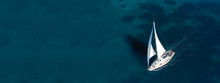 Aerial Drone Ultra Wide Photo Of Beautiful Sail Boat Sailing In Tropical Exotic Bay With Emerald Clear Sea