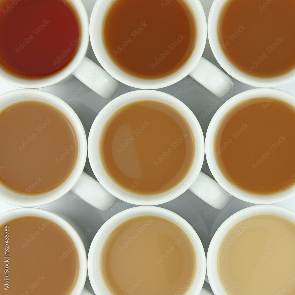 Overhead photo of a spectrum of different strength of tea  - obrazy, fototapety, plakaty 