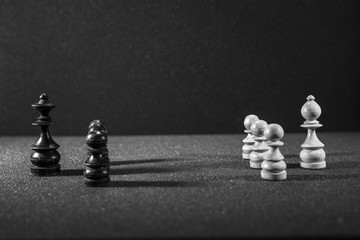 Image of Chess Pieces on Board for Game; black and white style