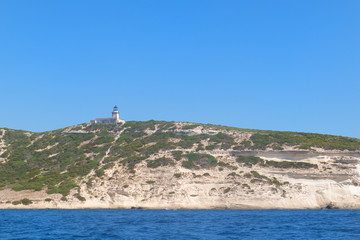 Wall Mural - Lighthouse on island Corsica near Bonifacio