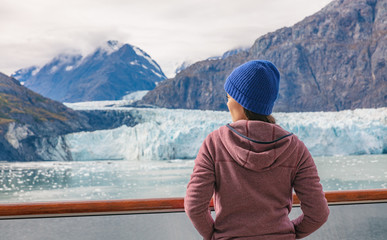 Wall Mural - alaska cruise inside passage to glacier bay national park woman tourist relaxing on deck watching la