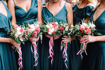 bridesmaids wedding bouquets in hands