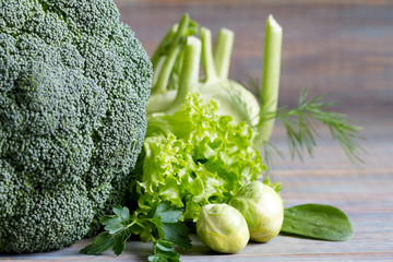 Green health vegetables on wooden table food still life