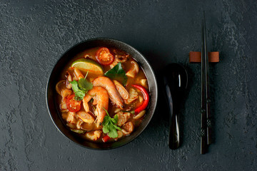 Wall Mural - Tom Yam on a dark background