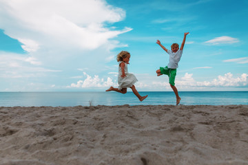 Poster - happy boy and girl enjoy beach, kids play at sea