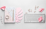 Fototapeta Kwiaty - Computer keyboard with stationery on white background