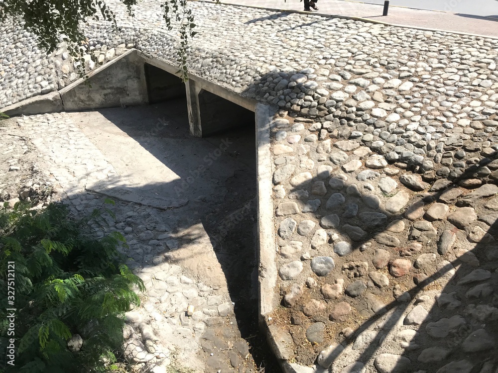 concrete box culvert with two channels with construction of apron head ...