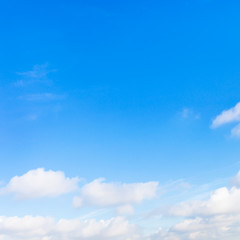 Wall Mural - low little clouds in blue sky
