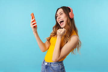 Poster - Portrait of beautiful woman wearing headphones listening to music