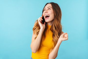 Poster - Portrait of beautiful joyous woman smiling and talking on cellphone