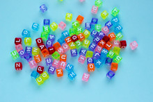 Colorful Beads With ABC Letters. Hobby And Education Background.