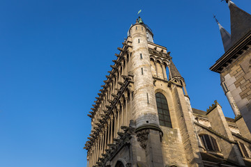 Wall Mural - Church of Notre-Dame of Dijon, street view with ancient buildings in Dijon, France