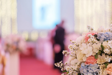 Beautiful flowers and blurred of Wedding ceremony event indoor background