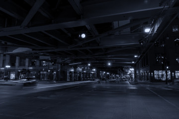 Poster - Chicago, night traffic between bridges and skyscrapers