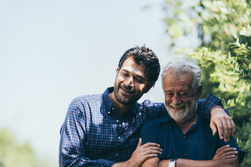 The happy father and son greeting outdoor