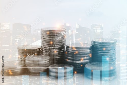 Fotomural Double exposure of city view , diagram bar and line graph , rows of coins for fi