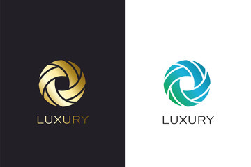 Wall Mural - Luxury circle abstract logo vector design. Gold colored