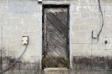 Wall Mural - old wood door concrete alley warehouse building abandoned