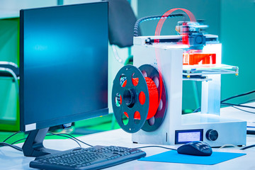 Poster - 3d printer near the monitor. printer for printing three-dimensional models. desktop 3d printer. comp