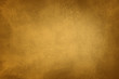 grunge golden leather background or texture with stains