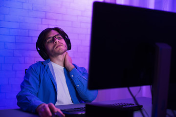 Aufkleber - Tired Programmer Working On Computer Touching Aching Neck At Home