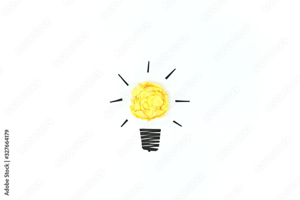 Yellow crumpled paper light bulb isolated in white background. Creativity and innovation concept. - obrazy, fototapety, plakaty 