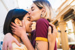 © Mego-studio - Loving lesbian couple at the street.