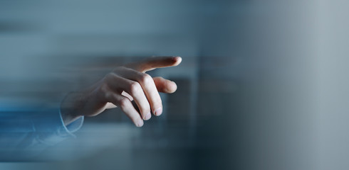business man presses on touch screen