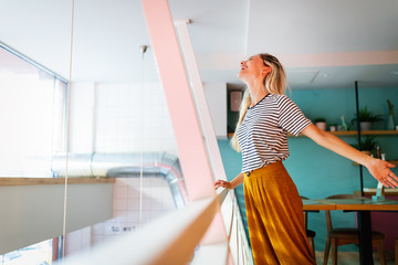 Wall Mural - Portrait of beautiful young happy woman smiling and having fun