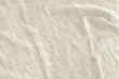 © vaitekune - Pure washed linen cloth background. Natural washed linen fabric..