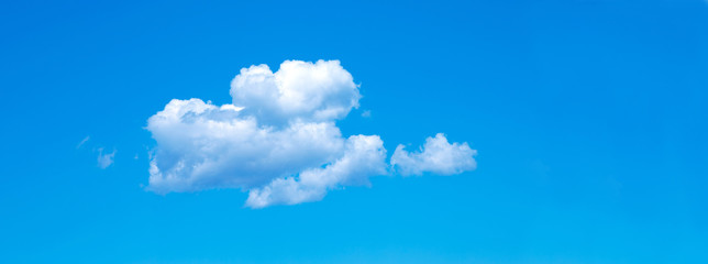 Wall Mural - blue sky background with tiny clouds