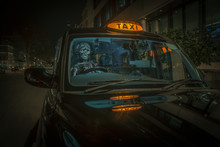 Zombie Monster Driving A Taxi In The City