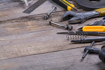 Wall Mural - repair tools on wooden background