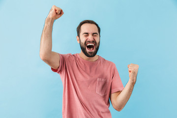 Poster - Excited surprised man make winner gesture.