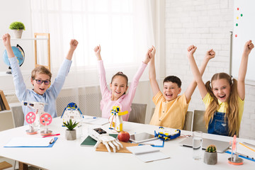 Poster - Finish robotic course. Children cheering and raising hands