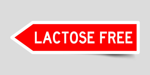 Wall Mural - Red color arrow sticker with word lactose free on gray background