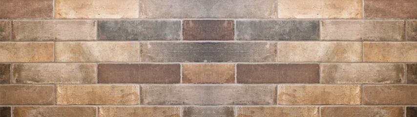 Brown gray natural stone tiles masonry wall texture background banner