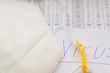 © dzmitry_2014 - protective medical dressing lies on statistical tables and paper with the inscription virus