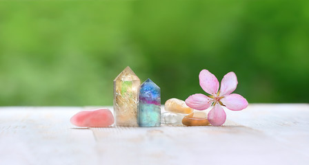 Wall Mural - fluorite, citrine, pink quartz and flower. gemstones crystal minerals for relaxation and meditation. Healing Crystal Ritual. copy space