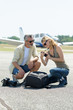 © auremar - researchers inspecting the photographs taken during the flight
