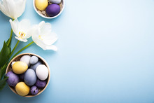 Naturally Colorful Dyed Easter Eggs On Blue Background. Happy Easter Holiday Theme, Banner