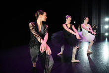 Choreographer And Young Female Ballerinas On Stage