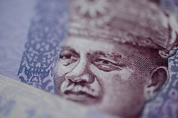 Malaysia currency of Malaysian ringgit banknotes background. Paper money of hundred ringgit notes etreme closeup. Financial concept.